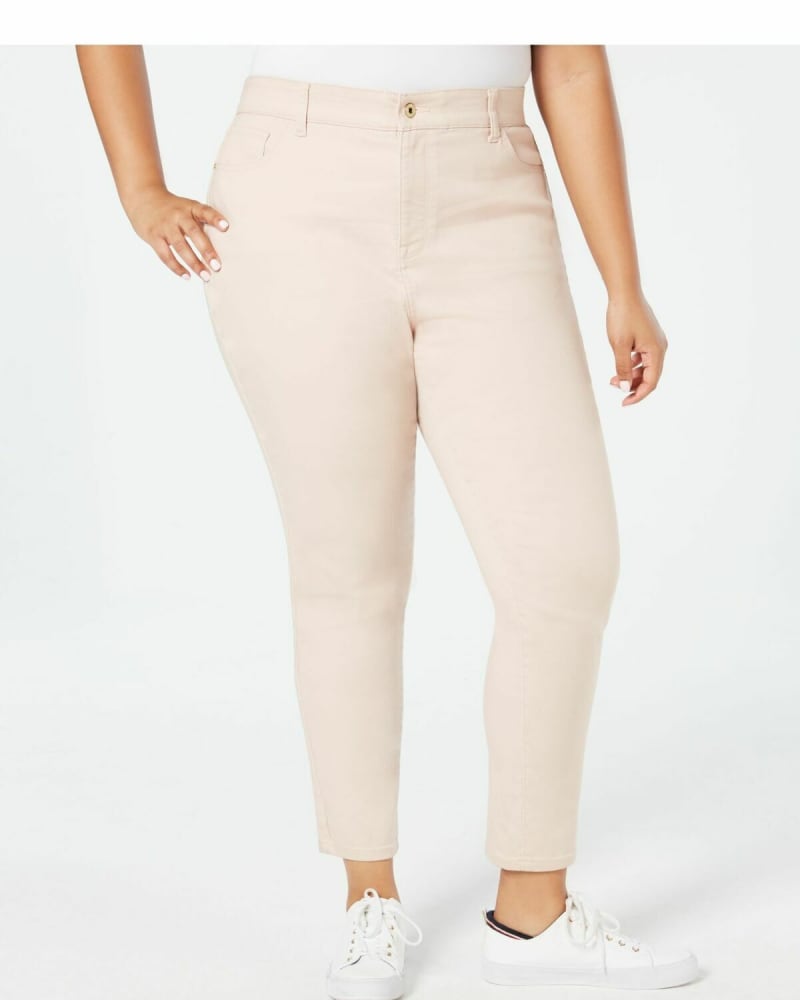 Front of a model wearing a size 16W Tommy Hilfiger Women's Bedford Skinny Jeans Pink 16W in Pink by Tommy Hilfiger. | dia_product_style_image_id:308491